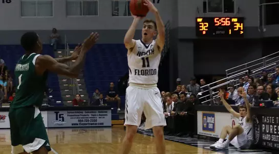 Garrett Sams pulls up for a three-pointer against Florida National
