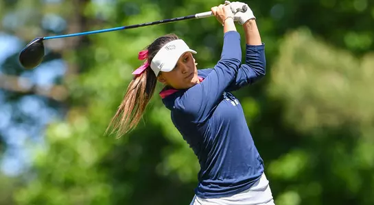Daniela Gonzalez hits a drive off the tee box