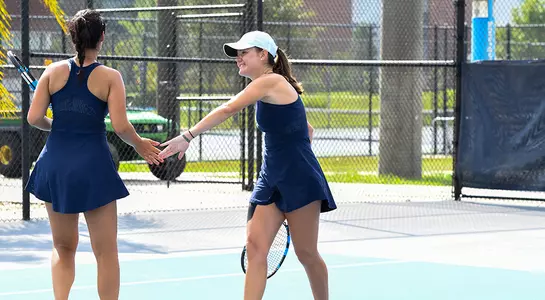Mariotto (left) and Gorches celebrate