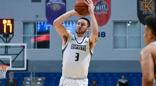 JT Escobar shoots a three-pointer