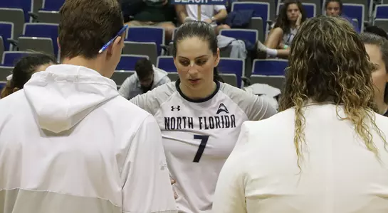 Solimar Cestero listening during a timeout.