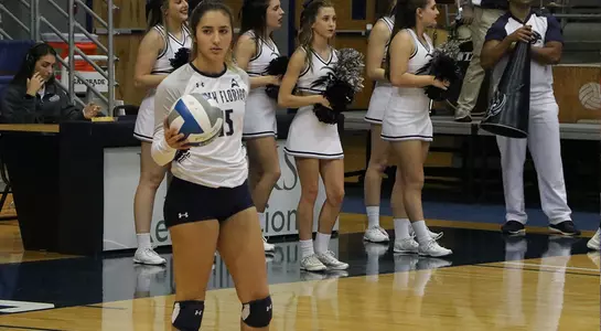 Angelie Rosario gets ready to serve.