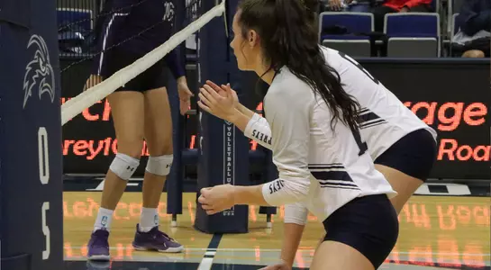 Grace Youngblood awaits the serve.