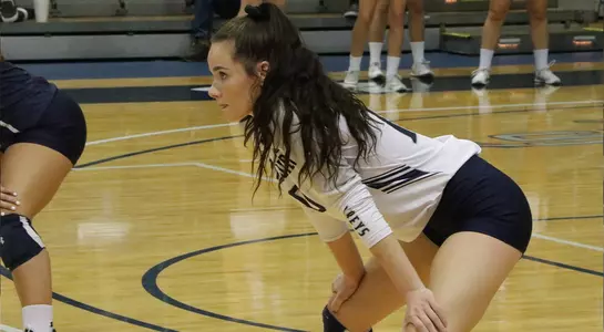 Grace Youngblood awaits the serve.