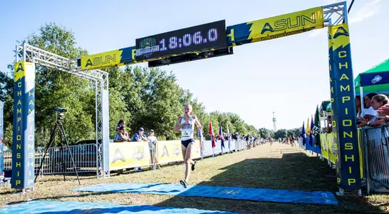 Grace Gumpel crosses the finish line at the ASUN XC Championship