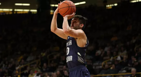 Ivan Gandia-Rosa takes a jump shot against Iowa