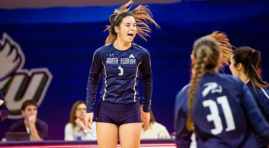 Julianna Askew jumps to celebrate a point.