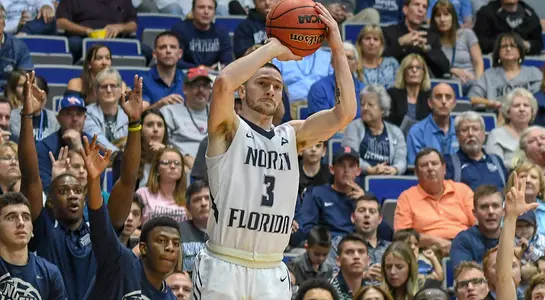 JT Escobar shoots a three-pointer