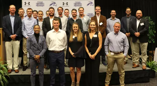 Hall of Fame Class of 2020 grouped together on the stage at induction ceremony