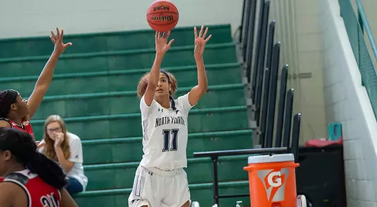 Jazz Bond shoots a three-pointer against Nicholls State