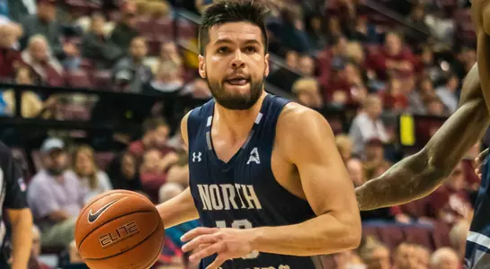 Ivan Gandia-Rosa looks to pass the basketball