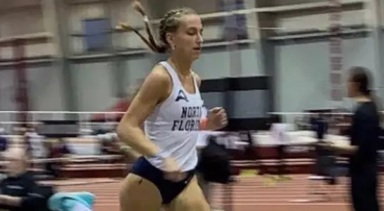 Lydia van Dijk races to the finish line of the mile race at the Carolina Challenge