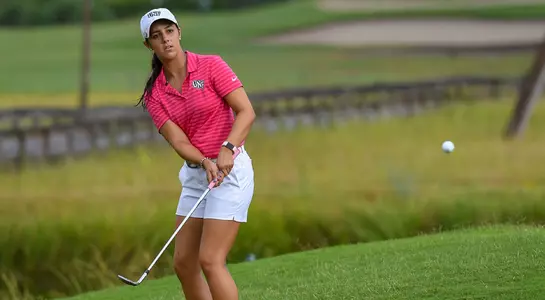 Mindy Herrick putts the ball toward the hole
