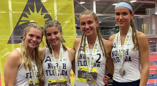 Quartet of Harley Horsley, Crystal Liebenberg, Sonja Andenmatten and Lydia van Dijk pose with their silver medals at ASUN Championship