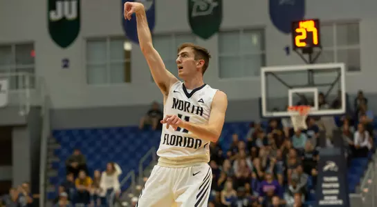 Garrett Sams holds his follow through on a jump shot at UNF Arena