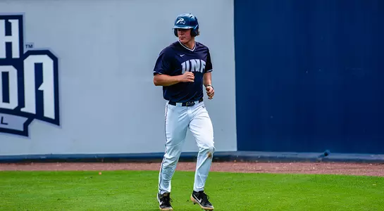 Tanner May runs back to dugout