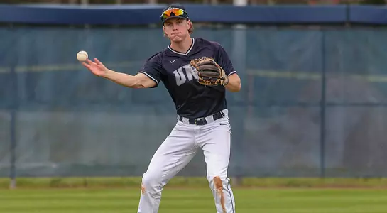 Tanner May throws from outfield