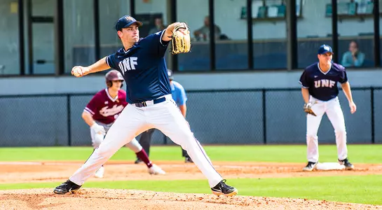Max McKinley mid throw from pitcher mound