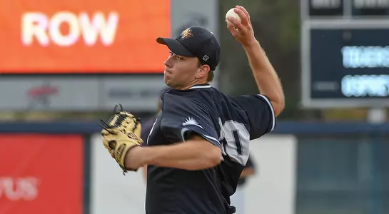 Max McKinley throws pitch from mound at UNF baseball game
