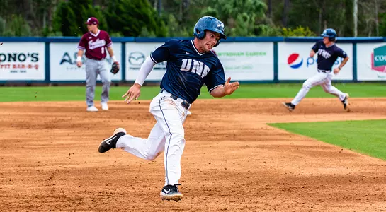 Jay Prather running to base after hit