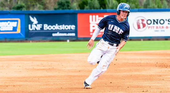 Jay Prather advances toward home plate after hit