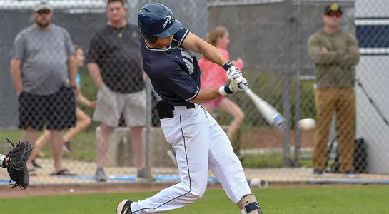 Wes Weeks swings through and hits pitch