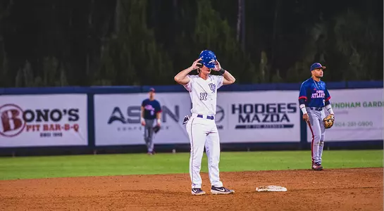 Tanner Clark stands at second base.