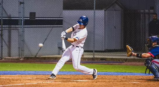 Tanner Clark swings at a pitch.