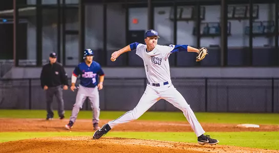 Logan Clayton rears back to make a pitch.