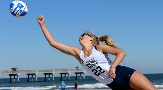 Blaire Register dives after the ball.