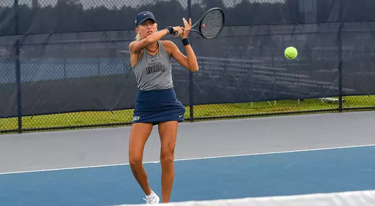 Kinga Gartner forehand action shot.