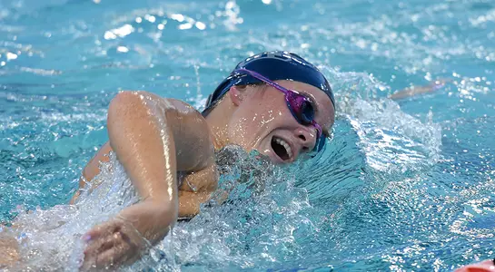 Grace Cozad swims during a freestyle event.