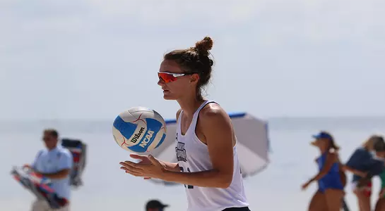 Antonia Harrison gets ready to serve a ball.