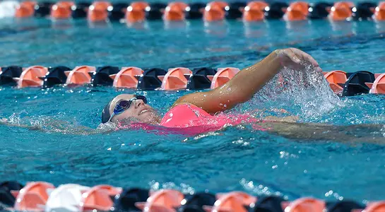 Swimmer Julianna Graf swims a backstroke event.