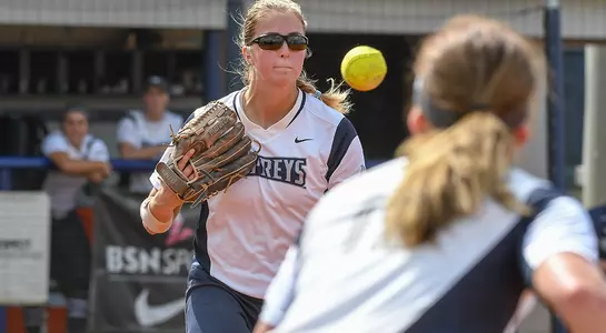 UNF pitcher Sydney Matzko throws over to first after getting a ground ball.