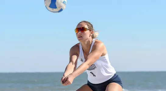 Beach volleyball player Dana Roskic digs a ball at Jacksonville Beach.