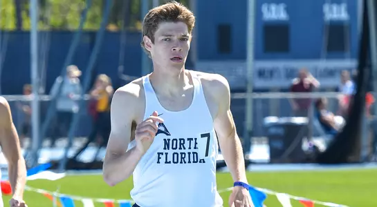 George Escobar runs strongly toward the finish line