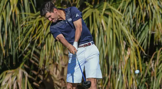 Philip Knowles hits a drive