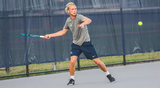 Till Von Winning about to hit a forehand