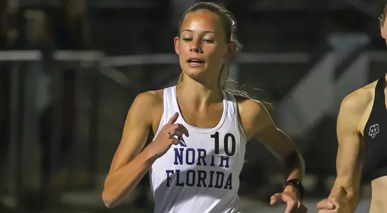 Audrey Carpenter crosses the finish line