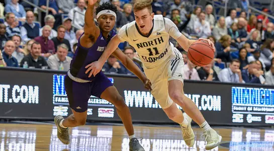 Garrett Sams dribbles to the basket against North Alabama
