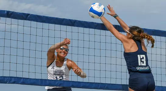 Nicole DeBolt spikes ball over net for UNF