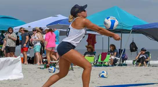 Chaney Howard sets ball at UNF Invitational