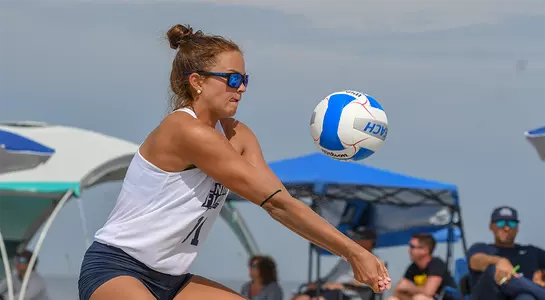 Madilyn McCarty bumps ball to teammate