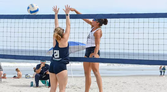 Brittany Pase tips ball over the net to advance the Ospreys