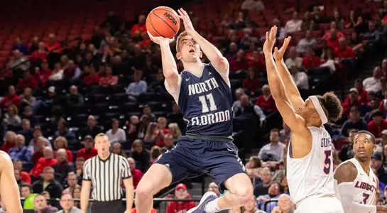 Garrett Sams shoots a layup against Liberty in the ASUN Tournament
