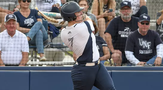 Paige Pfent swings the bat at the plate as softball plays Northern Iowa.