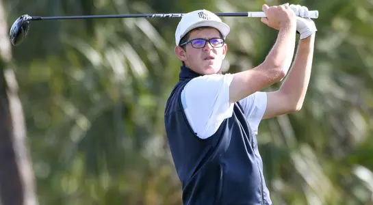 Cody Carroll watches his tee shot travel down the fairway