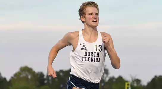 Noah Perkins races to finish line