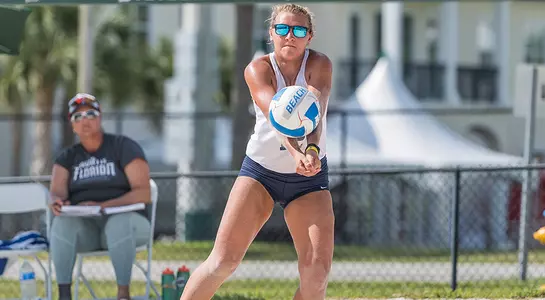 Nicole DeBolt gets under the ball to dig it out.